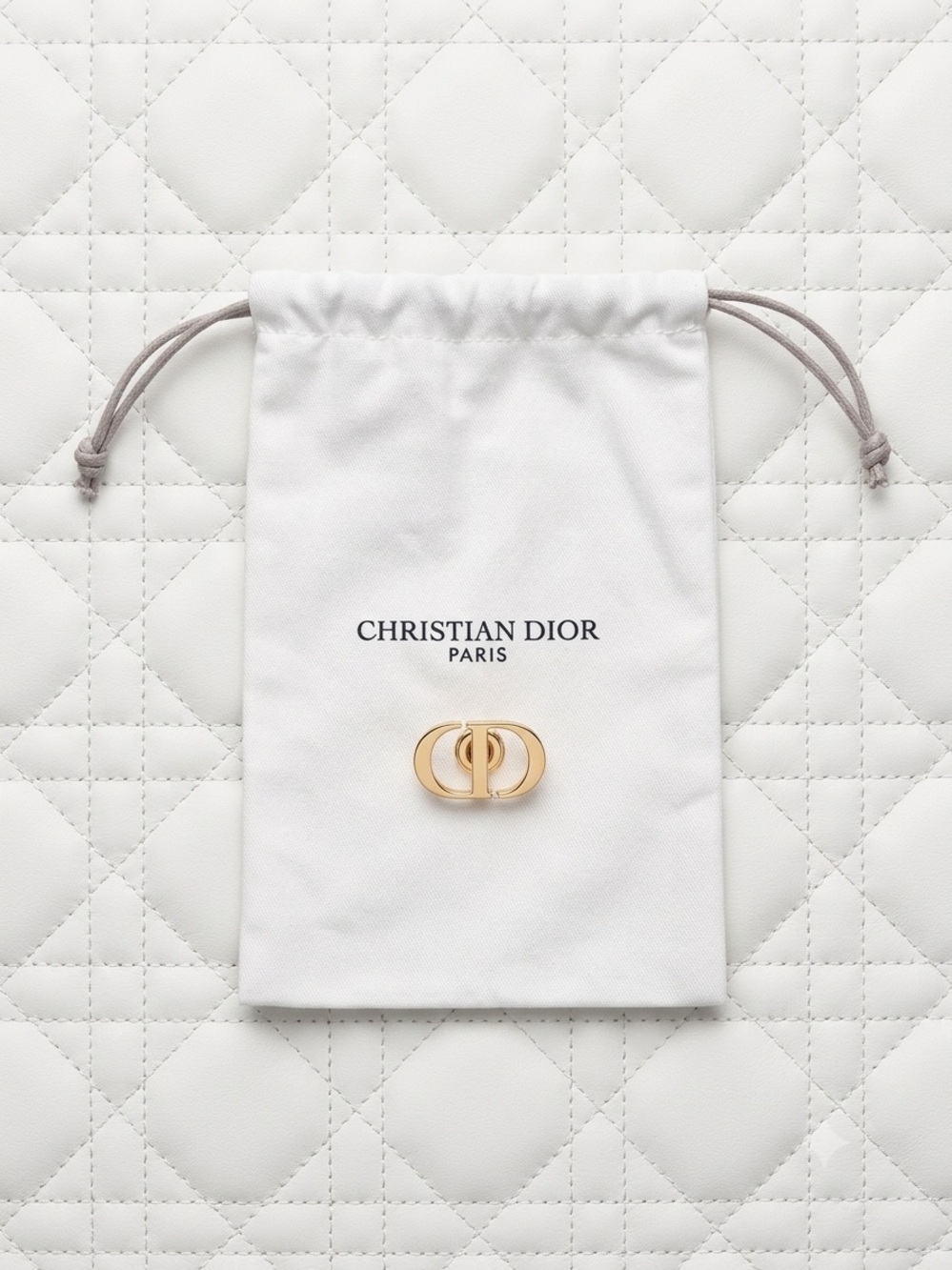 Dior Gold CD Logo Pin with White Drawstring Pouch